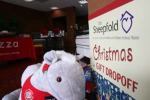 custom comfort participates in sheepfold and toys for tots gift drives for the holidays