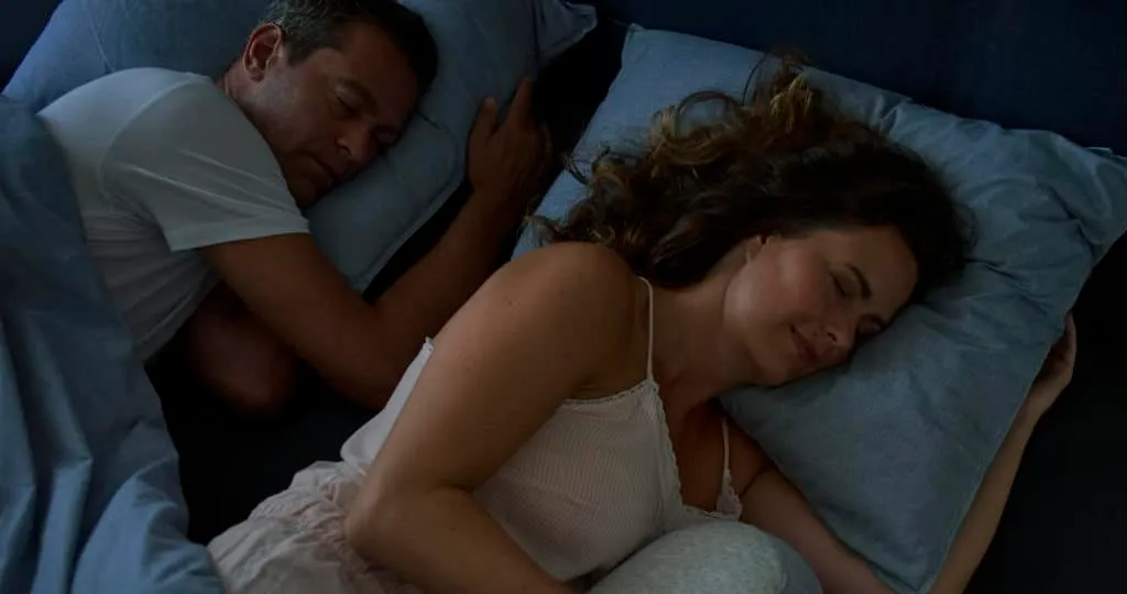 Couple in Bed Sleeping